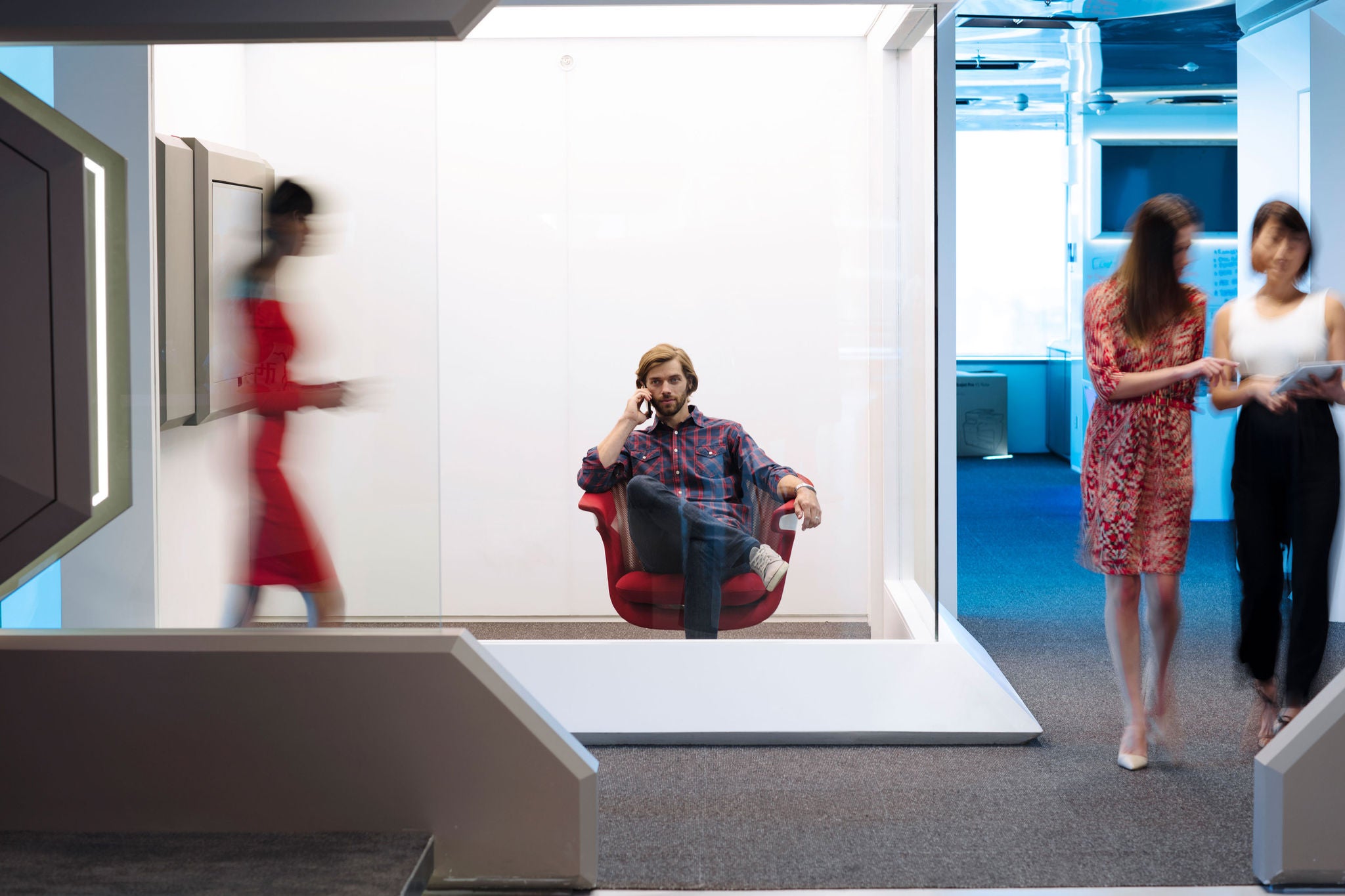 Cape Town, South Africa, colleagues together in futuristic city office.