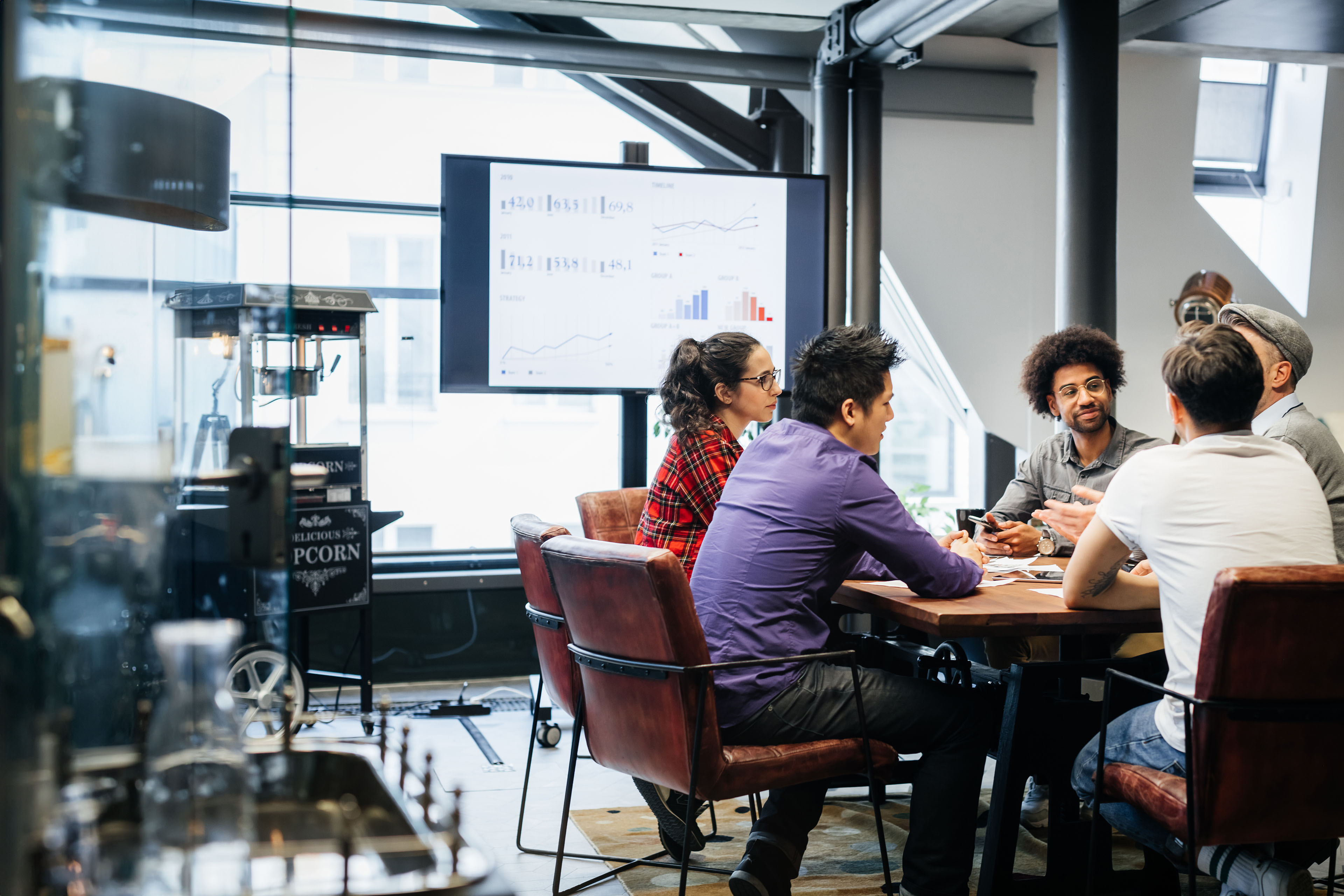 Group Of Managers Holding Meeting At The Office